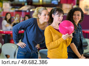 a first attempt on bowling. Стоковое фото, агентство Ingram Publishing / Фотобанк Лори