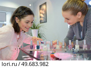 display of nail varnish on the counter. Стоковое фото, агентство Ingram Publishing / Фотобанк Лори