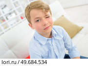 a little boy is winking. Стоковое фото, агентство Ingram Publishing / Фотобанк Лори