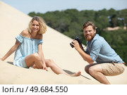 fashion photo shoot of beautiful sexy woman on dune. Стоковое фото, агентство Ingram Publishing / Фотобанк Лори