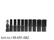 Top view of a set of chrome vanadium sockets for a ratchet, wrench, or spanner, isolated on white background. Стоковое фото, фотограф Корнеев Вячеслав / Фотобанк Лори