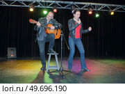 a band performing on stage. Стоковое фото, агентство Ingram Publishing / Фотобанк Лори