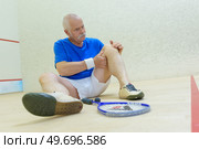senior man injured his knee. Стоковое фото, агентство Ingram Publishing / Фотобанк Лори