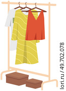 Wardrobe, womens clothing on stand in dressing room. Choosing clothes, garments for outfit concept. Hanger for home or boutique interior. Colored dresses on hangers for fitting room or showroom. Wardrobe, womens clothing on stand in dressing room. Choosing clothes, garments for outfit concept. Стоковая иллюстрация, агентство Ingram Publishing / Фотобанк Лори