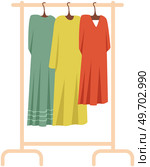Wardrobe, womens clothing on stand in dressing room. Choosing clothes, garments for outfit concept. Hanger for home or boutique interior. Colored dresses on hangers for fitting room or showroom. Wardrobe, womens clothing on stand in dressing room. Choosing clothes, garments for outfit concept. Стоковая иллюстрация, агентство Ingram Publishing / Фотобанк Лори