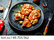 Chicken chops with tomato, olives and cheese. Healthy keto. Tasty breaded chicken meat steaks. Стоковое фото, агентство Ingram Publishing / Фотобанк Лори