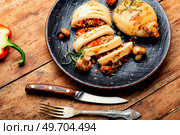 Baked squid with vegetable stuffing. Bbq seafood.. Roasted whole squid. Стоковое фото, агентство Ingram Publishing / Фотобанк Лори