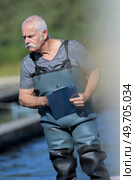 portrait of male aquaculture businessman. Стоковое фото, агентство Ingram Publishing / Фотобанк Лори