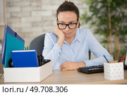 female employee being fired from her work. Стоковое фото, агентство Ingram Publishing / Фотобанк Лори