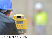 a man is a land surveyor. Стоковое фото, агентство Ingram Publishing / Фотобанк Лори