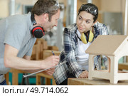 working on a wood piece. Стоковое фото, агентство Ingram Publishing / Фотобанк Лори