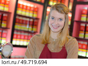 portrait of happy female seller in pharmaceutical store. Стоковое фото, агентство Ingram Publishing / Фотобанк Лори