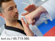 Kid in a karate lesson. Стоковое фото, агентство Ingram Publishing / Фотобанк Лори
