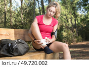 woman with injured ankle during sport activity. Стоковое фото, агентство Ingram Publishing / Фотобанк Лори