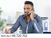 businessman on the phon e. Стоковое фото, агентство Ingram Publishing / Фотобанк Лори