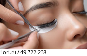 Applying eyelash extensions in a beauty salon during a professional treatment. Наращивание ресниц в салоне красоты во время профессиональной процедуры. Стоковое AI-изображение, AI-художник Katsiaryna Repich / Фотобанк Лори