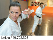 synchronize movement in martial arts. Стоковое фото, агентство Ingram Publishing / Фотобанк Лори