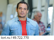 portrait of a man in an industrial facility. Стоковое фото, агентство Ingram Publishing / Фотобанк Лори