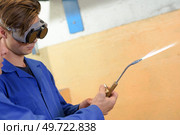young solderer in the workshop. Стоковое фото, агентство Ingram Publishing / Фотобанк Лори