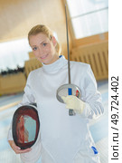 portrait of a female fencer. Стоковое фото, агентство Ingram Publishing / Фотобанк Лори