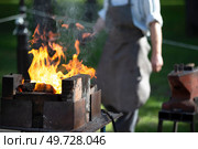 They make a fire in a special grill for blacksmithing. Стоковое фото, фотограф Лазаренко Светлана / Фотобанк Лори