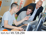senior with wheelchair student and friend. Стоковое фото, агентство Ingram Publishing / Фотобанк Лори