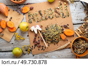 muesli word collecting from real horse muesli and granules for sportive horses.  feeding and horse care concept. Стоковое фото, агентство Ingram Publishing / Фотобанк Лори