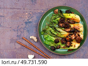 Chinese fried Pak Choi with shitake mushrooms. Healthy food. Copy space. Roasted baby bok choy. Стоковое фото, агентство Ingram Publishing / Фотобанк Лори