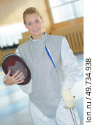 portrait of a female fencer. Стоковое фото, агентство Ingram Publishing / Фотобанк Лори