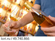 a man tasting a nice liquor. Стоковое фото, агентство Ingram Publishing / Фотобанк Лори