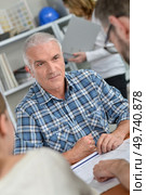 consultant during meeting with couple. Стоковое фото, агентство Ingram Publishing / Фотобанк Лори