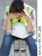 a stressed engineer construction worker. Стоковое фото, агентство Ingram Publishing / Фотобанк Лори