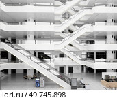 escalators at the modern shopping mall. 3D design render. escalators at the modern shopping mall. Стоковое фото, агентство Ingram Publishing / Фотобанк Лори