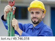 operator and hook of construction crane. Стоковое фото, агентство Ingram Publishing / Фотобанк Лори