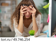 female office worker is tired of work and exhausted. Стоковое фото, агентство Ingram Publishing / Фотобанк Лори