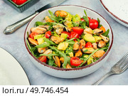 Spring vitamin salad of mussels, arugula, tomato and avocado.. Seafood salad with mussels. Стоковое фото, агентство Ingram Publishing / Фотобанк Лори
