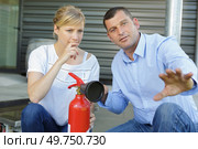 a man doing firefighting drill. Стоковое фото, агентство Ingram Publishing / Фотобанк Лори