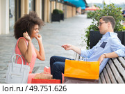 female shopaholic getting the boyfriends card. Стоковое фото, агентство Ingram Publishing / Фотобанк Лори