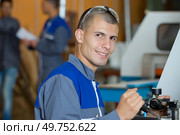 a young male shipbuilder posing. Стоковое фото, агентство Ingram Publishing / Фотобанк Лори