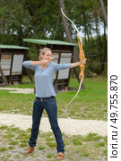 woman and archery proper position. Стоковое фото, агентство Ingram Publishing / Фотобанк Лори