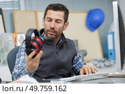 construction supervisor planning new project in office. Стоковое фото, агентство Ingram Publishing / Фотобанк Лори