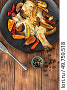 Roasted flounder fish, flatfish on rustic wooden table. Rustic style. Fried flounder fish. Стоковое фото, агентство Ingram Publishing / Фотобанк Лори