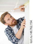 painter working at construction site. Стоковое фото, агентство Ingram Publishing / Фотобанк Лори