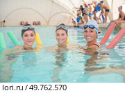 close up of three happy swimmers. Стоковое фото, агентство Ingram Publishing / Фотобанк Лори