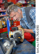 he is fixing the connection. Стоковое фото, агентство Ingram Publishing / Фотобанк Лори