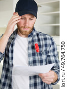 a puzzled engineer feeling confused. Стоковое фото, агентство Ingram Publishing / Фотобанк Лори