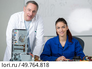 confident student and informatics teacher. Стоковое фото, агентство Ingram Publishing / Фотобанк Лори