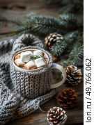 A cup filled with steaming hot chocolate topped with fluffy marshmallows.. A Cup of Hot Chocolate With Marshmallows. Стоковое фото, агентство Ingram Publishing / Фотобанк Лори