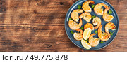 Delicious grilled king prawns with lemon and herb marinade. Copy space.. Tiger Prawn Scampi. Стоковое фото, агентство Ingram Publishing / Фотобанк Лори