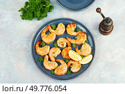 Grilled fried prawns shrimps with herb marinade. Seafood. Flat lay. Grilled giant river prawn. Стоковое фото, агентство Ingram Publishing / Фотобанк Лори
